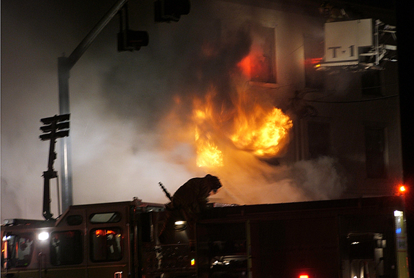 Flames burst from a Sunday morning fire at the corner of Maine and Mason streets in Brunswick. The fire damaged the building to the extent that it had to be demolished Sunday afternoon. Flames burst from a Sunday morning fire at the corner of Maine and Mason streets in Brunswick. The fire damaged the building to the extent that it had to be demolished Sunday afternoon.