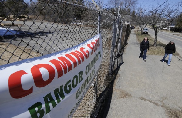During their lunch break Friday, Leslie Suddy (left) of Veazie and Rhoda Turner, co-workers at Neurology Associates of Eastern Maine, walk past the soon-to-open Bangor Community Garden off Essex Street in Bangor. Photographed Friday, April 8, 2011. During their lunch break Friday, Leslie Suddy (left) of Veazie and Rhoda Turner, co-workers at Neurology Associates of Eastern Maine, walk past the soon-to-open Bangor Community Garden off Essex Street in Bangor. Photographed Friday, April 8, 2011.
