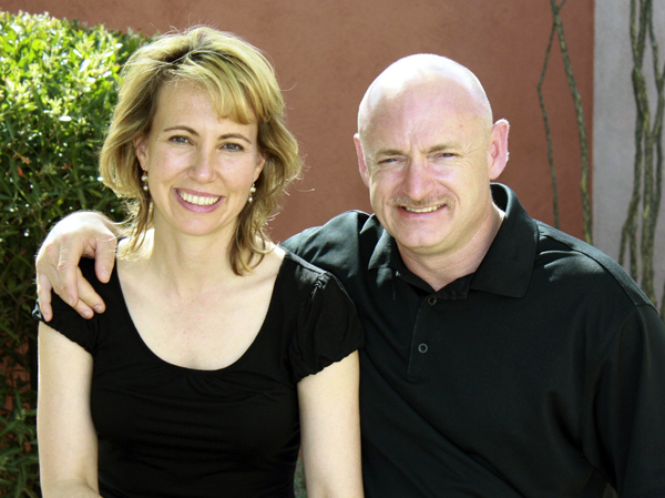 Gabrielle Giffords with her husband, NASA astronaut Mark Kelly. Aides to Giffords have been preparing for her to travel to Florida to watch her husband's space shuttle launch planned for the end of April, although doctors have yet to clear her to go. Gabrielle Giffords with her husband, NASA astronaut Mark Kelly. Aides to Giffords have been preparing for her to travel to Florida to watch her husband's space shuttle launch planned for the end of April, although doctors have yet to clear her to go.