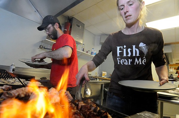 Unity College alumni Becky Traylor (right), Class of 2003, and Dennis Rumba, Class of 2000, both of Searsmont, grilled puddle duck and bacon kebabs for Unity College's Wild Game dinner at the Unity College Centre for the Performing Arts on Friday evening, April 15, 2011. All the profits from the charity event will go to Operetion Game Thief, the Maine Warden Service Association and Catch-A-Dream and Hunt of Lifetime. Unity College alumni Becky Traylor (right), Class of 2003, and Dennis Rumba, Class of 2000, both of Searsmont, grilled puddle duck and bacon kebabs for Unity College's Wild Game dinner at the Unity College Centre for the Performing Arts on Friday evening, April 15, 2011. All the profits from the charity event will go to Operetion Game Thief, the Maine Warden Service Association and Catch-A-Dream and Hunt of Lifetime.