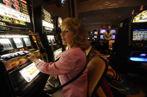 Elizabeth Milliken of Old Orchard Beach plays the slot machines at Hollywood Slots in Bangor in June 2009. Elizabeth Milliken of Old Orchard Beach plays the slot machines at Hollywood Slots in Bangor in June 2009.