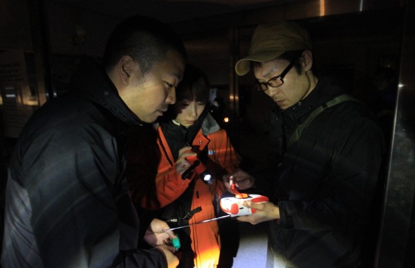 Members of a Japanese rescue team listen for news Friday, April 8, 2011 in Ichinoseki, Iwate Prefecture, northern Japan, after a 7.4-magnitude earthquake struck offshore, late Thursday. The quake hit about 11:30 p.m. Thursday Japan time. It has rattled nerves nearly a month after the devastating earthquake and tsunami that flattened the northeastern coast. Members of a Japanese rescue team listen for news Friday, April 8, 2011 in Ichinoseki, Iwate Prefecture, northern Japan, after a 7.4-magnitude earthquake struck offshore, late Thursday. The quake hit about 11:30 p.m. Thursday Japan time. It has rattled nerves nearly a month after the devastating earthquake and tsunami that flattened the northeastern coast.