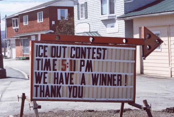 George Dumond of Fort Kent created a mechanism connecting a pallet in the Fish River to a clock in the Boy Scout building near the Block House. When the ice goes out the moving pallet pulls the plug and stops the clock, making the person who bought a $2 ticket for that minute the winner of a $200 prize. This sign shows the winning time of 5:11 p.m. in 2009. George Dumond of Fort Kent created a mechanism connecting a pallet in the Fish River to a clock in the Boy Scout building near the Block House. When the ice goes out the moving pallet pulls the plug and stops the clock, making the person who bought a $2 ticket for that minute the winner of a $200 prize. This sign shows the winning time of 5:11 p.m. in 2009.