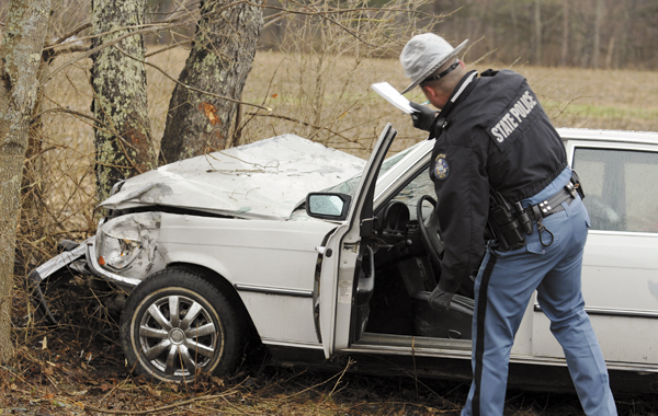 State Police Trooper Doug Franklin inspects the damage to a Mercedes Benz after it was crashed on the Griffin Road in Levant on Wednesday.
John Ryan of Corrina, the driver of the vehicle was charged with driving without a license and failing to report a personal injury accident. He also faces several traffic violations for having an unregistered vehicle, and driving an uninspected and uninsured car. State Police Trooper Doug Franklin inspects the damage to a Mercedes Benz after it was crashed on the Griffin Road in Levant on Wednesday.
John Ryan of Corrina, the driver of the vehicle was charged with driving without a license and failing to report a personal injury accident. He also faces several traffic violations for having an unregistered vehicle, and driving an uninspected and uninsured car.