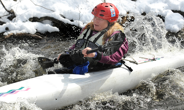 Leslie Gregory negotiates the rapids near the Poors Mill Road during the Passagassawakeag River canoe race in Belfast Saturday. Leslie Gregory negotiates the rapids near the Poors Mill Road during the Passagassawakeag River canoe race in Belfast Saturday.