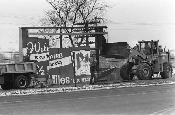 A billboard on Main Street in Bangor is torn down by Maine Department of Transportation workers in January 1984. A billboard on Main Street in Bangor is torn down by Maine Department of Transportation workers in January 1984.