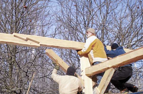 Timber framer and hewer Mike Beaudry of Montville constructs a roof frame using traditional joinery techniques. Timber framer and hewer Mike Beaudry of Montville constructs a roof frame using traditional joinery techniques.