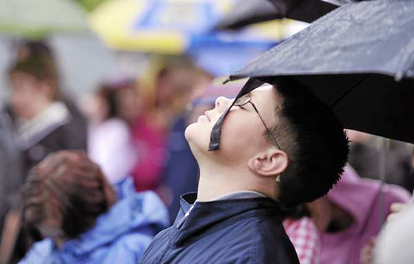 Under partial umbrella cover, Alex McKenney, 11, a sixth grader at Bangor Christian School joined several hundred other worshippers in prayer during the National Day of Prayer event at the Bass Park gazebo in Bangor Thursday afternoon. This long-time annual observance, ordained by Congress in 1952, was established to allow citizens to "turn to God in prayer and meditation." Under partial umbrella cover, Alex McKenney, 11, a sixth grader at Bangor Christian School joined several hundred other worshippers in prayer during the National Day of Prayer event at the Bass Park gazebo in Bangor Thursday afternoon. This long-time annual observance, ordained by Congress in 1952, was established to allow citizens to "turn to God in prayer and meditation."