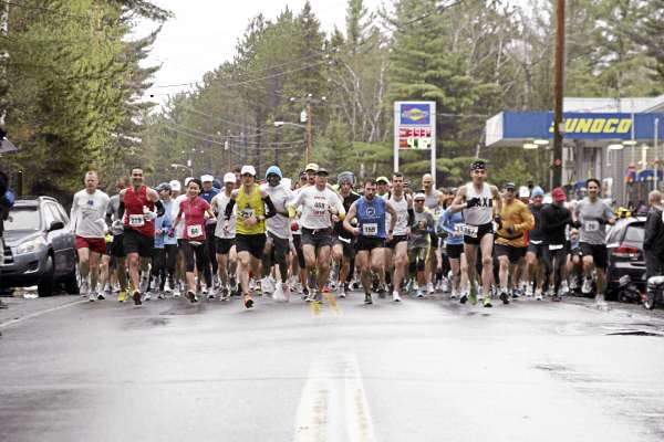 Runners take off from the starting line in the 29th Sugarloaf Marathon Sunday. Runners take off from the starting line in the 29th Sugarloaf Marathon Sunday.
