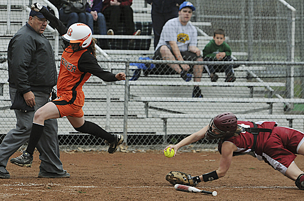 Brewer's Missy Thompson avoids a tag by Bangor catcher Sadie Redman to score a second-inning run at the Bangor High School field Thursday. Thompson advanced on a fielder's choice grounder by Deaven Smith. Brewer defeated Bangor 10-7. Brewer's Missy Thompson avoids a tag by Bangor catcher Sadie Redman to score a second-inning run at the Bangor High School field Thursday. Thompson advanced on a fielder's choice grounder by Deaven Smith. Brewer defeated Bangor 10-7.