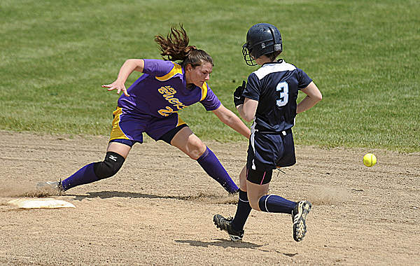 Presque Isle High School's Shea Brown (right) runs to second base as Bucksport shortstop Shelby Redman waits for the throw during the first inning of the first game of a doubleheader in Bucksport Monday. Presque Isle High School's Shea Brown (right) runs to second base as Bucksport shortstop Shelby Redman waits for the throw during the first inning of the first game of a doubleheader in Bucksport Monday.