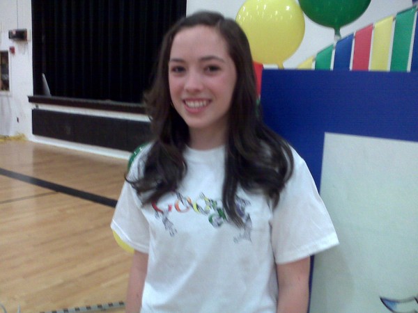 Brewer High School freshman Morgan Forrest, 15, stands beside her design for the Doodle 4 Google contest after officials announced at a school assembly that she is one of 40 finalists. More than 107,000 art students from all over the United States submitted designs, officials from Google announced. Folks that want to vote for her design can go to google.com/doodle4google. Brewer High School freshman Morgan Forrest, 15, stands beside her design for the Doodle 4 Google contest after officials announced at a school assembly that she is one of 40 finalists. More than 107,000 art students from all over the United States submitted designs, officials from Google announced. Folks that want to vote for her design can go to google.com/doodle4google.