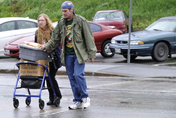 Joined by supporter Mike Noyes, right, of Cherryfield, Vicki Barnard, left, of Gouldsboro, wife of Jeffrey Barnard, carted legal documents across Harlow Street on her way to a hearing for her husband in U.S. District Court Tuesday morning, May 17, 2011. Jeffrey Barnard, 47, of Gouldsboro made an appearance in U.S. District Court in Bangor Tuesday, May 17 hoping for leniency for repeated use of marijuana while on federal probation. He has a medical marijuana registration card so he can use marijuana to help alleviate his medical issues. Joined by supporter Mike Noyes, right, of Cherryfield, Vicki Barnard, left, of Gouldsboro, wife of Jeffrey Barnard, carted legal documents across Harlow Street on her way to a hearing for her husband in U.S. District Court Tuesday morning, May 17, 2011. Jeffrey Barnard, 47, of Gouldsboro made an appearance in U.S. District Court in Bangor Tuesday, May 17 hoping for leniency for repeated use of marijuana while on federal probation. He has a medical marijuana registration card so he can use marijuana to help alleviate his medical issues.