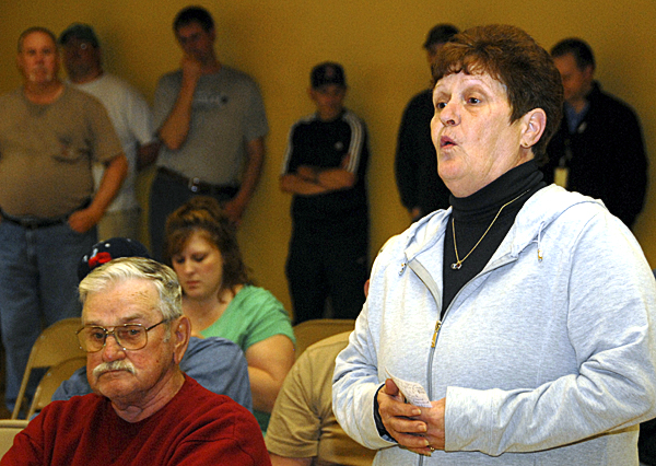 East Millinocket resident Cathy King speaks out against the possible layoffs of a town police officer and a firefighter as a result of a massive paper mill revaluation on Tuesday. East Millinocket resident Cathy King speaks out against the possible layoffs of a town police officer and a firefighter as a result of a massive paper mill revaluation on Tuesday.