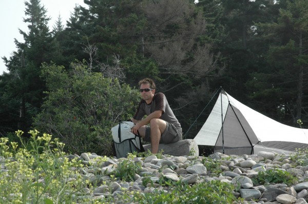 Mike St. Pierre of Biddeford, founder and CEO of Hyperlite Mountain Gear, sits in front of his Echo I Tarp, just 1.31 pounds. In his hands is the Windrider Ultralight Pack, 1.6 pounds, which was selected as the “Best Ultralight Backpack” in Backpacker Magazine’s 2011 Gear Guide. Mike St. Pierre of Biddeford, founder and CEO of Hyperlite Mountain Gear, sits in front of his Echo I Tarp, just 1.31 pounds. In his hands is the Windrider Ultralight Pack, 1.6 pounds, which was selected as the “Best Ultralight Backpack” in Backpacker Magazine’s 2011 Gear Guide.