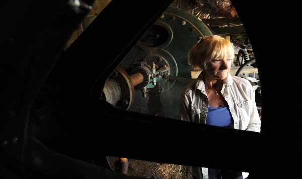 Cathy Gleeson, owner of the Goose River Hydro Company, with the turbine at the Mill Dam Powerhouse in Belfast. Gleeson is hoping that the City of Belfast might purchase from her the company that - if fully operating at all dams - can produce 1.5 Million KWH of electricity per year. Cathy Gleeson, owner of the Goose River Hydro Company, with the turbine at the Mill Dam Powerhouse in Belfast. Gleeson is hoping that the City of Belfast might purchase from her the company that - if fully operating at all dams - can produce 1.5 Million KWH of electricity per year.