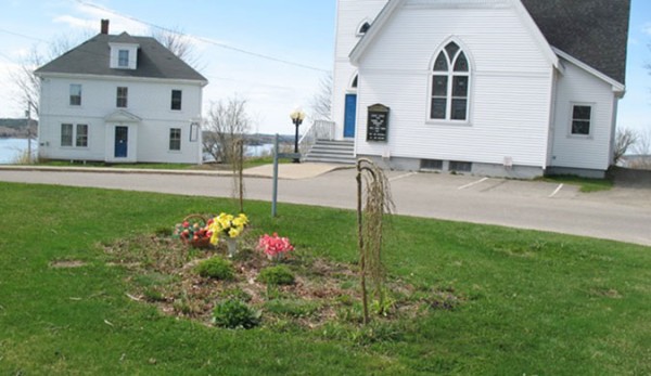 Fresh flowers were left at the Robert and Jackie Norton Memorial Garden in Lubec on Monday, May 2, 2011. The Nortons died in the Sept. 11 terrorist attacks. Fresh flowers were left at the Robert and Jackie Norton Memorial Garden in Lubec on Monday, May 2, 2011. The Nortons died in the Sept. 11 terrorist attacks.