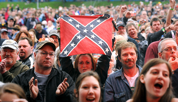 Fans react as members of the band Lynyrd Skynyrd appear on the stage during a concert at the Bangor Waterfront Thursday evening. Fans react as members of the band Lynyrd Skynyrd appear on the stage during a concert at the Bangor Waterfront Thursday evening.