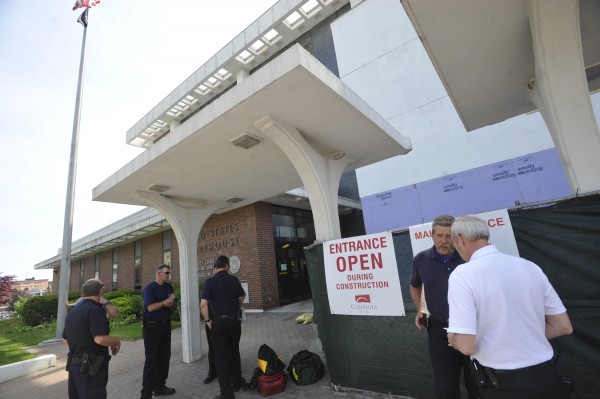 Bangor firefighters wait outside the Margaret Chase Smith Federal Building in downtown Bangor on Friday afternoon, May 27, 2011, after a suspicious letter was reported by a staffer at Sen. Olympia Snowe's office. A section of the building was isolated by fire crews, but the entire building was not evacuated. Bangor firefighters wait outside the Margaret Chase Smith Federal Building in downtown Bangor on Friday afternoon, May 27, 2011, after a suspicious letter was reported by a staffer at Sen. Olympia Snowe's office. A section of the building was isolated by fire crews, but the entire building was not evacuated.