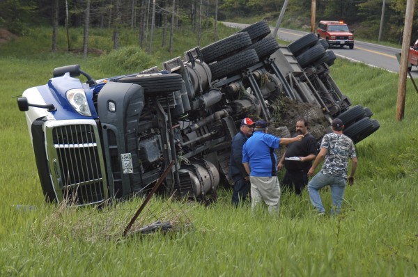 A Maritime Farms oil tanker rolled over Friday at about 5:45 p.m. on the northbound side of Route 1 in Warren in a field just north of Evergreen Ridge Alpacas farm. A Maritime Farms oil tanker rolled over Friday at about 5:45 p.m. on the northbound side of Route 1 in Warren in a field just north of Evergreen Ridge Alpacas farm.