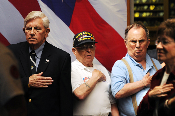 Nelson Durgin (from Left), along with Maine Troop Greeter Norman Rossignol, George Newhall and U.S. Sen. Susan Collins, listen as the National Anthem is sung during the 8th anniversary celebration of the Maine Troop Greeters at Bangor International Airport on Saturday, May 21, 2011. Nelson Durgin (from Left), along with Maine Troop Greeter Norman Rossignol, George Newhall and U.S. Sen. Susan Collins, listen as the National Anthem is sung during the 8th anniversary celebration of the Maine Troop Greeters at Bangor International Airport on Saturday, May 21, 2011.
