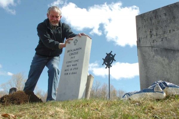 Larry Wahl of Orland straightens a new headstone which he helped install on the grave of Revolutionary War veteran Benjamin Gross on Sunday, May 1, 2011, at the Riverview Cemetery in Bucksport. The new headstone, which replaces the original one that had cracked in two due to age, will be formally dedicated on May 14. Larry Wahl of Orland straightens a new headstone which he helped install on the grave of Revolutionary War veteran Benjamin Gross on Sunday, May 1, 2011, at the Riverview Cemetery in Bucksport. The new headstone, which replaces the original one that had cracked in two due to age, will be formally dedicated on May 14.