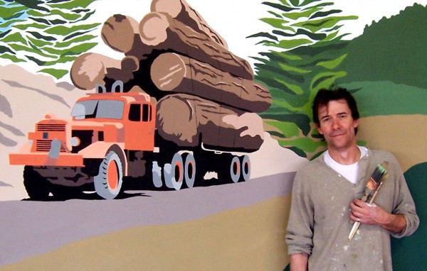 Chez Cherry, pictured next to his mural of famous Maine landmarks. Chez Cherry, pictured next to his mural of famous Maine landmarks.