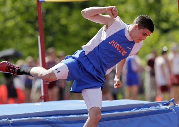 Penquis' Emery Shane celebrates after successfully clearing 5-feet 10-inches in the high jump competition at the Class C Track and Field Championships at McMann Field in Bath, Maine, Saturday, June 4, 2011. Penquis' Emery Shane celebrates after successfully clearing 5-feet 10-inches in the high jump competition at the Class C Track and Field Championships at McMann Field in Bath, Maine, Saturday, June 4, 2011.