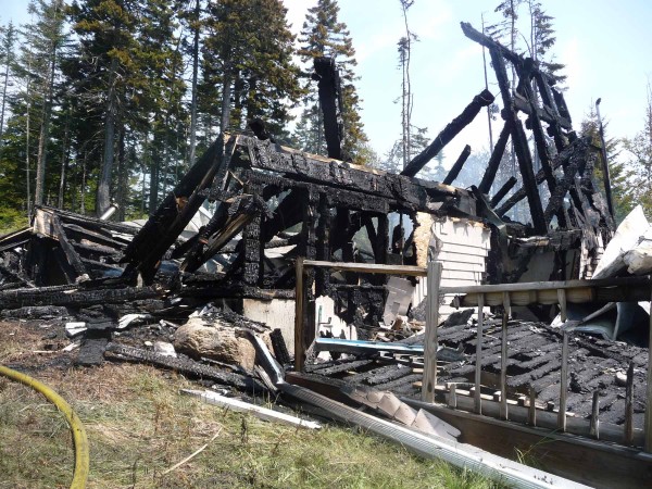 Dr. Joan Pelligrini of Holden said a lightning strike was responsible for an early morning fire that destroyed her seasonal home on Great Wass Island. Pelligrini said lightning struck a tree and dug a trench through the soil as it traveled to the home. "It's a total loss," she said, including many pieces of stained glass that she had created. "The only thing that survived was the captain's bell on the deck." Pelligrini was insured and said she will rebuild the home, which was built in 2006 overlooking the sea at Carver Industry Road. Dr. Joan Pelligrini of Holden said a lightning strike was responsible for an early morning fire that destroyed her seasonal home on Great Wass Island. Pelligrini said lightning struck a tree and dug a trench through the soil as it traveled to the home. "It's a total loss," she said, including many pieces of stained glass that she had created. "The only thing that survived was the captain's bell on the deck." Pelligrini was insured and said she will rebuild the home, which was built in 2006 overlooking the sea at Carver Industry Road.