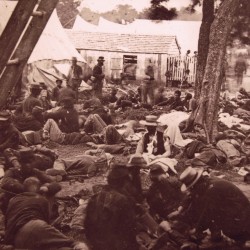 Union soldiers wounded during the July 29, 1862, Battle of Savage’s Station in Virginia lie outside a field hospital near the battlefield. Sarah Sampson was volunteering as a nurse at such a field hospital — perhaps even this one — when a Confederate attack overran the facility and forced her to flee to avoid capture.