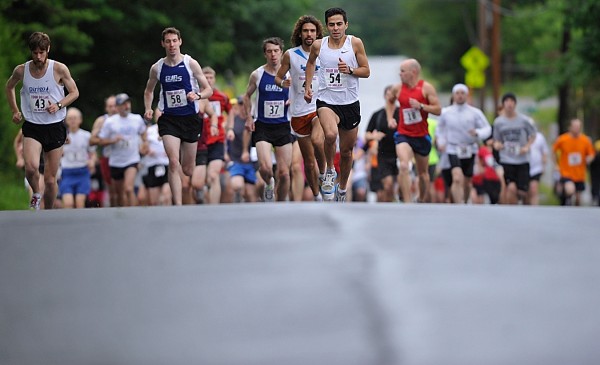 Eventual winner Louie Luchini (center) of Ellsworth lead the pack at the start of the 36th Tour Du Lac 10 miler in Bucksport on Saturday morning, June 25, 2011. Luchini, who also won last year, ran the course in 50:20, breaking the Gerry Clapper's 25-year-old record by 26 seconds. Eventual winner Louie Luchini (center) of Ellsworth lead the pack at the start of the 36th Tour Du Lac 10 miler in Bucksport on Saturday morning, June 25, 2011. Luchini, who also won last year, ran the course in 50:20, breaking the Gerry Clapper's 25-year-old record by 26 seconds.