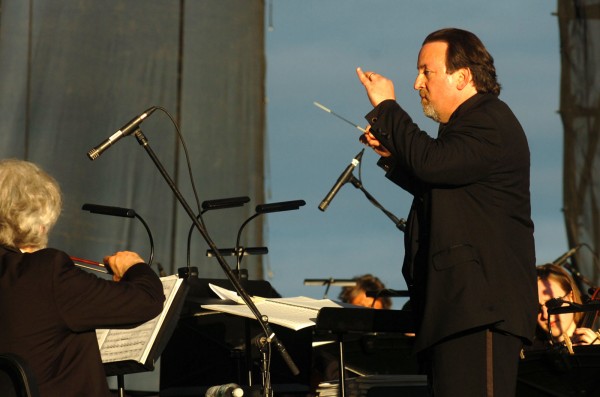 Bangor Symphony Orchestra conductor Lucas Richman leads the symphony during the opening song of Saturday's concert on the Bangor Waterfront. The concert featured Yesterday, a Beatles tribute band. Bangor Symphony Orchestra conductor Lucas Richman leads the symphony during the opening song of Saturday's concert on the Bangor Waterfront. The concert featured Yesterday, a Beatles tribute band.