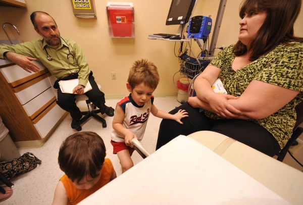 Dr. Mohammad Tabbah (top left), M.D., a pediatric gastroenterologist, talked with Angela Wortman (right) of Wytopitlock about her her three-year-old son Henry (second from right) whom she brought to Dr. Tabbah at EMMC for an appointment Wednesday afternoon, June 1, 2011. Angela Wortman and her mom Debi Perry (not pictured) of Lincoln brought the Angela's sons Henry and 18-month-old Michael to EMMC, concerned that Henry was having a recurring case of constipation. Angela Wortman was only 27 weeks pregnant when she gave birth to Henry via an emergency Cesarean. He weighed a mere one pound and seven ounces. With the help of EMMC and the Children's Miracle Network, Henry left the hospital 122 days later. On Saturday, June 4, Waterfont Concerts' benefit show, featuring the Beatles tribute band Yesterday Productions and the Bangor Symphony Orchestra, will donate proceeds from the ticket sales to Eastern Maine Children's Charities and the Children's Miracle Network. Dr. Mohammad Tabbah (top left), M.D., a pediatric gastroenterologist, talked with Angela Wortman (right) of Wytopitlock about her her three-year-old son Henry (second from right) whom she brought to Dr. Tabbah at EMMC for an appointment Wednesday afternoon, June 1, 2011. Angela Wortman and her mom Debi Perry (not pictured) of Lincoln brought the Angela's sons Henry and 18-month-old Michael to EMMC, concerned that Henry was having a recurring case of constipation. Angela Wortman was only 27 weeks pregnant when she gave birth to Henry via an emergency Cesarean. He weighed a mere one pound and seven ounces. With the help of EMMC and the Children's Miracle Network, Henry left the hospital 122 days later. On Saturday, June 4, Waterfont Concerts' benefit show, featuring the Beatles tribute band Yesterday Productions and the Bangor Symphony Orchestra, will donate proceeds from the ticket sales to Eastern Maine Children's Charities and the Children's Miracle Network.