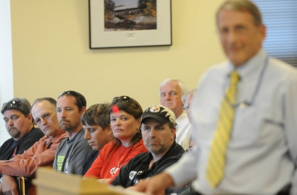 Maine union members and their labor representives listen to LD 390 lead sponsor Tom Winsor (right), R-Norway, argue for the bill during a public hearing before the Labor, Commerce, Research and Economic Development Committee in Augusta late Thursday afternoon, June 2, 2011. Maine union members and their labor representives listen to LD 390 lead sponsor Tom Winsor (right), R-Norway, argue for the bill during a public hearing before the Labor, Commerce, Research and Economic Development Committee in Augusta late Thursday afternoon, June 2, 2011.