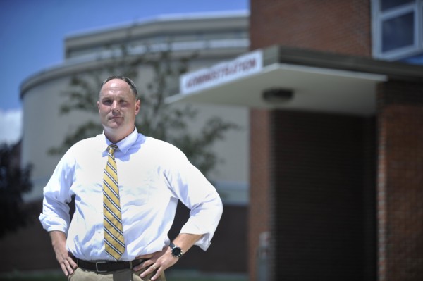 Bangor High School's new principal Paul Butler stands outside the school Thursday afternoon July 7, 2011. Butler replaces long-time principal Norris Nickerson who recently retired. Bangor High School's new principal Paul Butler stands outside the school Thursday afternoon July 7, 2011. Butler replaces long-time principal Norris Nickerson who recently retired.
