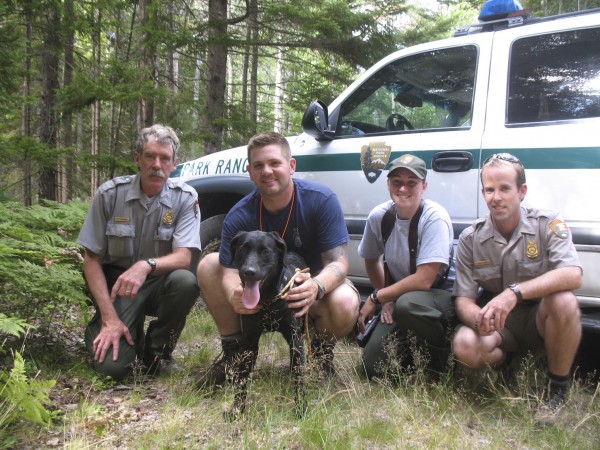 Bailey, an 8-month-old puppy who was stranded for up to four days on a ledge in Acadia National Park, was rescued Friday, July 29, 2011 by several park rangers including (from left to right) Ranger Ed Pontbriand, Ranger Jed Fiske, Ranger Heidi Greenleaf and Ranger Jacob Poley. Bailey, an 8-month-old puppy who was stranded for up to four days on a ledge in Acadia National Park, was rescued Friday, July 29, 2011 by several park rangers including (from left to right) Ranger Ed Pontbriand, Ranger Jed Fiske, Ranger Heidi Greenleaf and Ranger Jacob Poley.