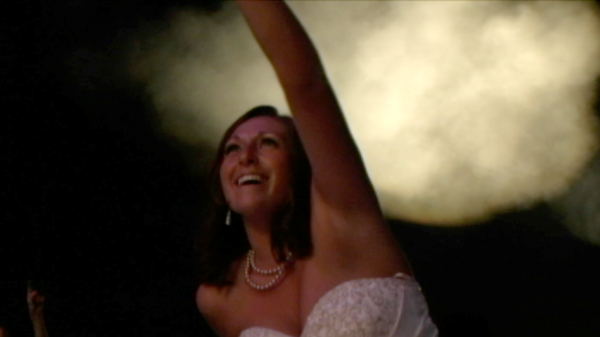 Erica Dyment sits on her husband's shoulders during the Toby Keith concert on the Bangor waterfront, which they attended just hours after their reception. Erica Dyment sits on her husband's shoulders during the Toby Keith concert on the Bangor waterfront, which they attended just hours after their reception.