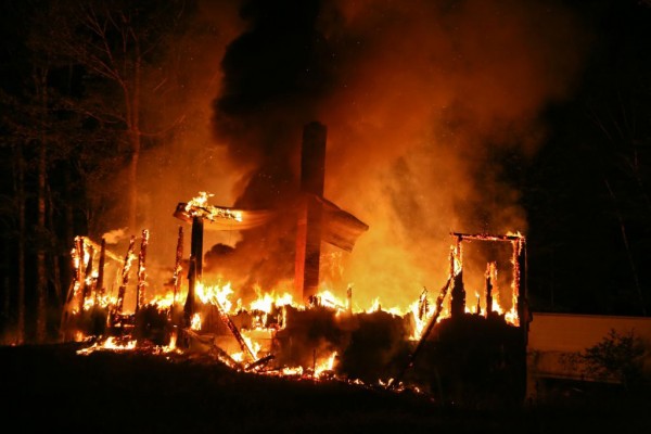 A fire destroyed a home on Pine Grove Road in Hudson on Tuesday. A fire destroyed a home on Pine Grove Road in Hudson on Tuesday.