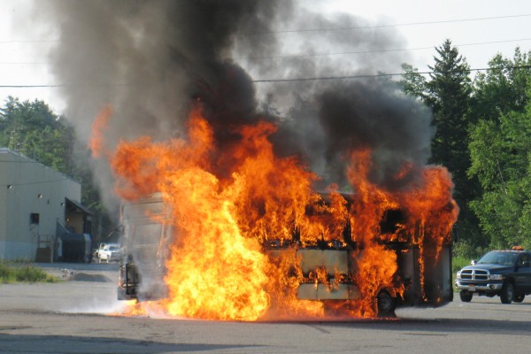 Tractor trailer driver Chris Quigg of Augusta made this photo of an Island Explorer bus burning this morning in Ellsworth. Tractor trailer driver Chris Quigg of Augusta made this photo of an Island Explorer bus burning this morning in Ellsworth.