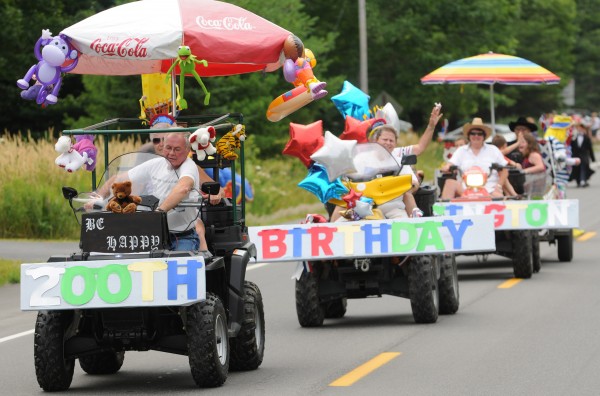 A string of ATVs carrying signs that read, "Happy 200th Birthday Eddington," form part of a parade held Saturday, July 23, 2011, along Route 9 to mark the 200th year of the town of Eddingotn. A string of ATVs carrying signs that read, "Happy 200th Birthday Eddington," form part of a parade held Saturday, July 23, 2011, along Route 9 to mark the 200th year of the town of Eddingotn.