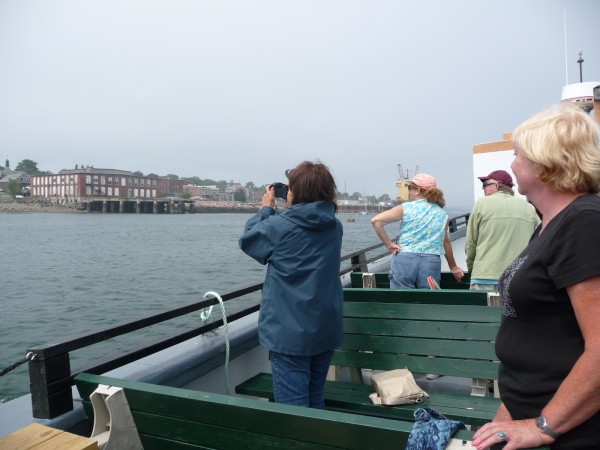 Ferry passengers take photographs as the Quoddy Dam arrives in Eastport from Lubec. "I was really excited to see there was a ferry," said Jeanne Smith-Cripps of New Hampshire, a visiting artist. "What a fabulous idea." Ferry passengers take photographs as the Quoddy Dam arrives in Eastport from Lubec. "I was really excited to see there was a ferry," said Jeanne Smith-Cripps of New Hampshire, a visiting artist. "What a fabulous idea."