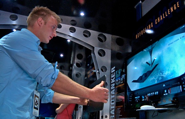 A participant in the Air National Guard’s Rise to the Challenge Tour
attempts to refuel a B-2 Spirit bomber in midairm. Bangor State Fair
participants can attempt the challenge, a free seven-stage
interactive-gaming skills test for those age 13 and over, beginning on
Friday and running through Sunday. A participant in the Air National Guard’s Rise to the Challenge Tour
attempts to refuel a B-2 Spirit bomber in midairm. Bangor State Fair
participants can attempt the challenge, a free seven-stage
interactive-gaming skills test for those age 13 and over, beginning on
Friday and running through Sunday.