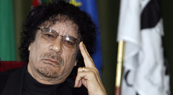 In a Dec. 7, 2007 file photo Libyan leader Moammar Gadhafi gestures while speaking during media conference at the University of Lisbon, in Lisbon. In a Dec. 7, 2007 file photo Libyan leader Moammar Gadhafi gestures while speaking during media conference at the University of Lisbon, in Lisbon.