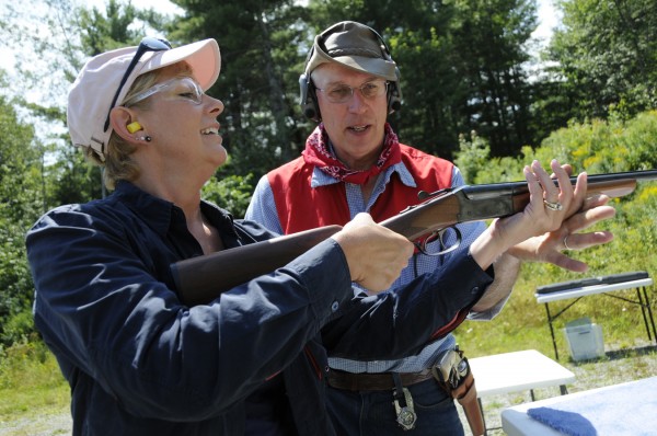 Debbie Harman of Penobscot gets a few pointers on proper shotgun handling from Albert Faust during Saturday's open house event at the Hampden Rifle and Pistol Club, of which Faust is a member. The Penobscot County Conservation Association sponsored the introductory shooting sports event at the club with the help of a National Rifle Association Foundation grant. Debbie Harman of Penobscot gets a few pointers on proper shotgun handling from Albert Faust during Saturday's open house event at the Hampden Rifle and Pistol Club, of which Faust is a member. The Penobscot County Conservation Association sponsored the introductory shooting sports event at the club with the help of a National Rifle Association Foundation grant.