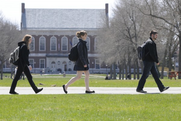 Students walk across the University of Maine Mall in Orono between classes in April. Students walk across the University of Maine Mall in Orono between classes in April.