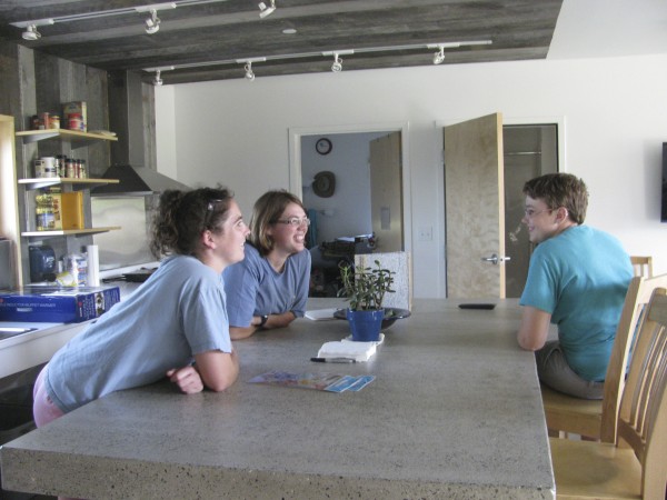 TerraHaus Resident Assistant Ashley Sutton, student Katie Papoulias and resident Melissa Merritt talk Friday in the Unity College building's kitchen area. Students are moving in this week to the new, eco-friendly building. TerraHaus Resident Assistant Ashley Sutton, student Katie Papoulias and resident Melissa Merritt talk Friday in the Unity College building's kitchen area. Students are moving in this week to the new, eco-friendly building.