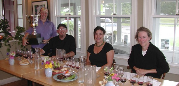 Christy Greer (from left) of the Badger Cafe and Pub in Union holds the Badger Cup as judges Michael Greer, Keri Lupine and Sarah Greer pause from their judging duties as they decided which blueberry wines will take the prize. Christy Greer (from left) of the Badger Cafe and Pub in Union holds the Badger Cup as judges Michael Greer, Keri Lupine and Sarah Greer pause from their judging duties as they decided which blueberry wines will take the prize.
