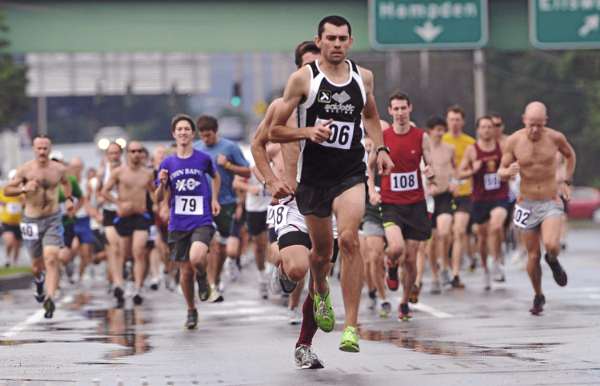 Judson Cake maintained the lead position throughout the 49th Annual Bangor Labor Day Five Mile Road Race Monday morning. Judson Cake maintained the lead position throughout the 49th Annual Bangor Labor Day Five Mile Road Race Monday morning.
