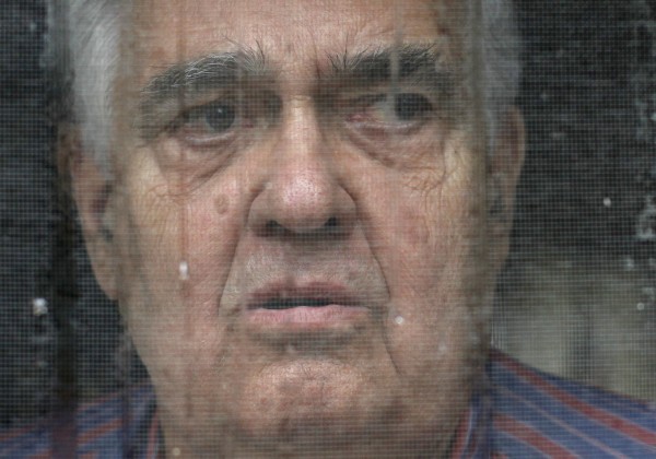 In this Sept. 15, 2011 photo, Bill Ricker, 74, looks out the screen door of his trailer home on a rainy day, in Hartford, Maine. Ricker, who has two college degrees, has worked as an electronics repairman, a pastor and a TV cameraman. He and his first wife had seven children. Now he receives food stamps and heating fuel assistance and gets donations from a local food pantry. In this Sept. 15, 2011 photo, Bill Ricker, 74, looks out the screen door of his trailer home on a rainy day, in Hartford, Maine. Ricker, who has two college degrees, has worked as an electronics repairman, a pastor and a TV cameraman. He and his first wife had seven children. Now he receives food stamps and heating fuel assistance and gets donations from a local food pantry.