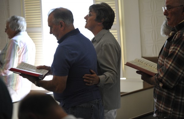 Willie Hustus and her husband, Dean Hustus (second from left), join other congregants in Sunday's Labor Day weekend hymn sing at North Searsport United Methodist Church. Willie Hustus and her husband, Dean Hustus (second from left), join other congregants in Sunday's Labor Day weekend hymn sing at North Searsport United Methodist Church.